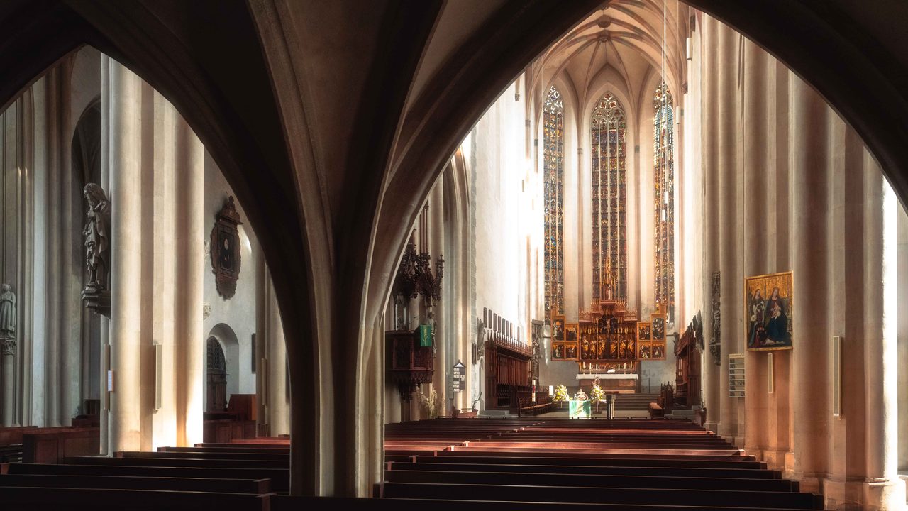 The nave of a church, looking towards the altar.
