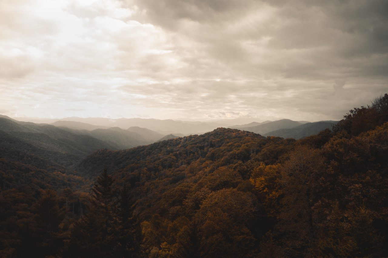 Autumn ridges falling away into the light.