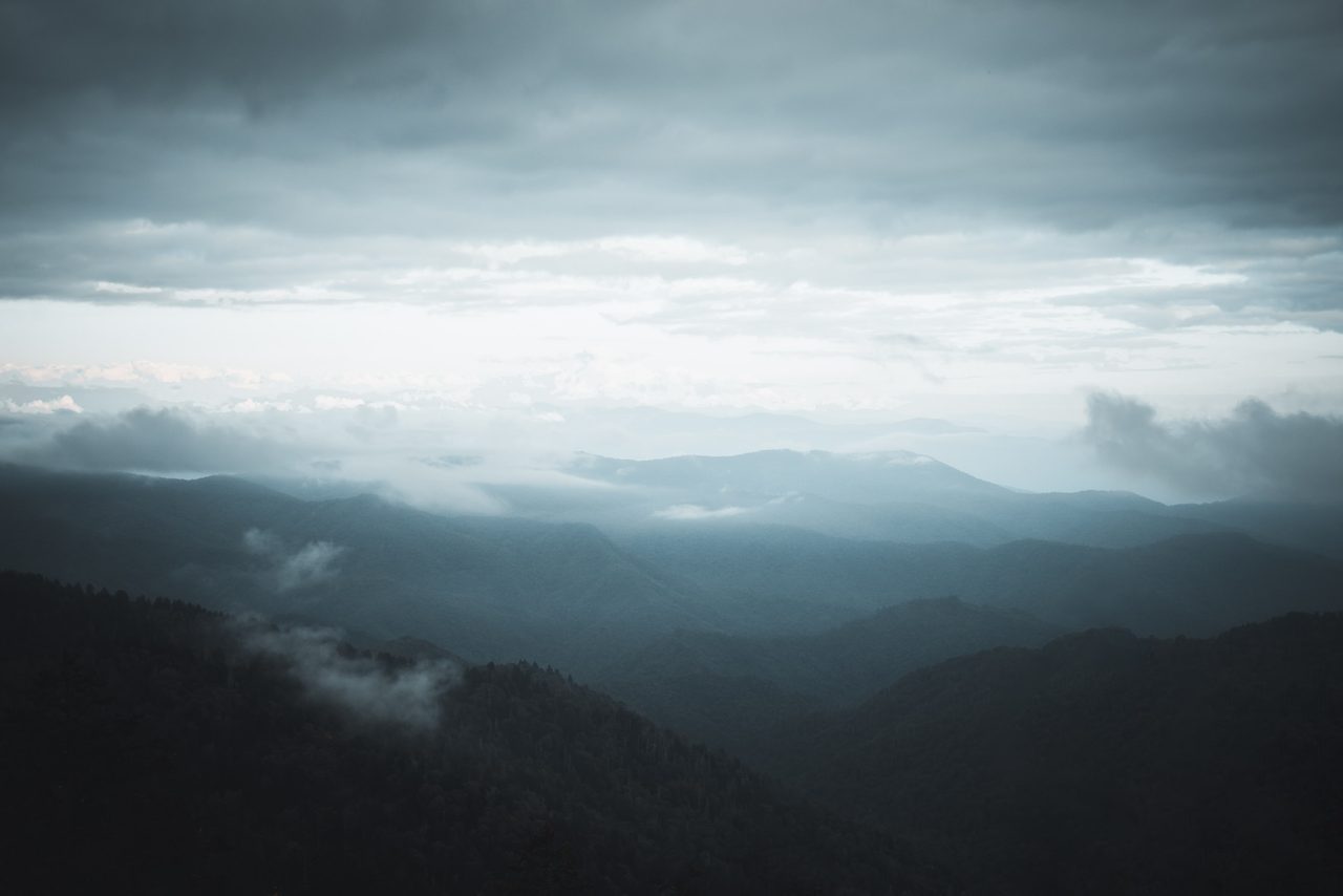 Layered ridges receding into mist.